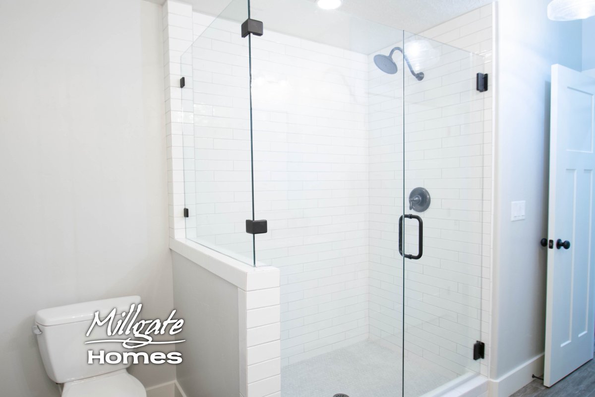 MillgateHomes's tweet photo. Loving this bold shower combination featuring euro-glass, black accessories, subway tile walls &amp; penny tile flooring. Let's get started on your basement finishing project today, give us a call! #utahhomes #utahcontractor #utahbasementfinishing #utahbuilder #euroglass #subwaytile https://t.co/rdpINgIuGF