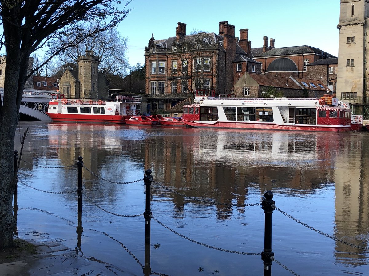 Reflections of @citycruisesyork in the flooded Ouse: sadly not going far for a while. #boats #york #reflection #water #riverouse #flood