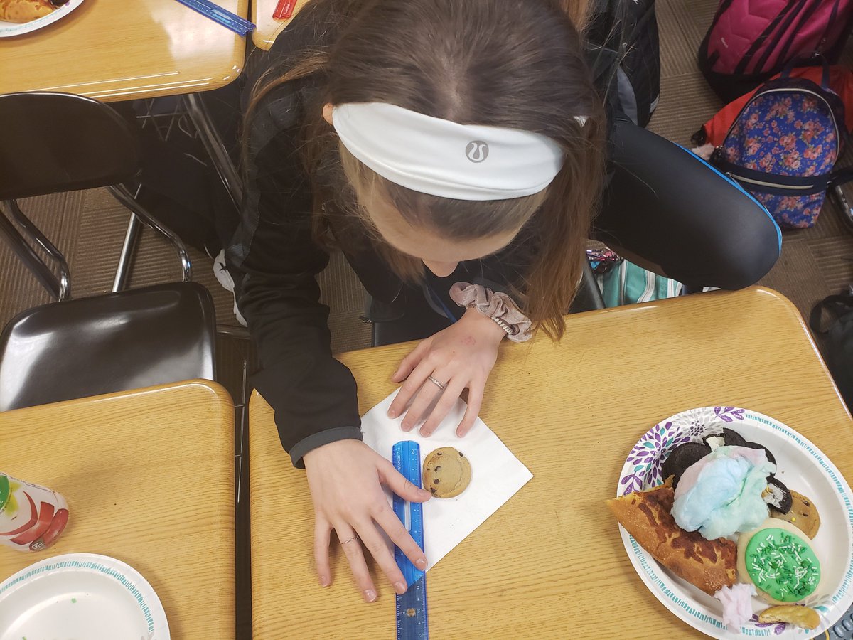RichmondHillMS's tweet photo. Mrs. Hackney’s 7th grade math classes celebrated Pi Day on March 14th by measuring the diameters of pies, cookies, and donuts and calculating the circumferences. They also enjoyed a BrainPOP and the story “Sir Cumference and the Dragon of Pi.”  #WeAreRHMS https://t.co/LPIwcWxORi