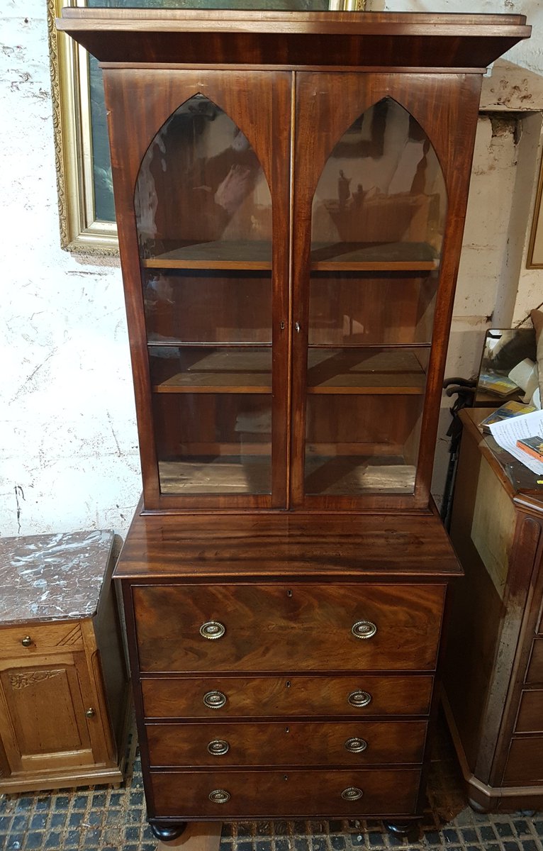 OldStable24's tweet photo. A lovely Regency era Secretaire bookcase in Honduras mahogany. It has great proportions only being 34' wide.  Lovely original patina and colour. In New Street for sale today. https://t.co/f7TDUCucnr