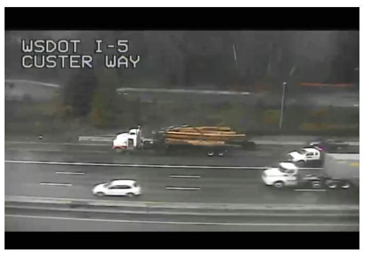 wsdot_tacoma's tweet photo. The #LastLog is being loaded from an early log spill SB I-5 at Custer Way in Olympia. After that, a sweeper will clear the area and the on-ramp from US 101 to SB I-5 will reopen. Thank you for your patience. Remember to please #SecureYourLoad. https://t.co/X7ygek6hM2