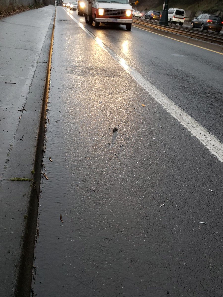 This is a first! Nails in the SOUTHBOUND bike lane of N Interstate now. @PDXReporter. <a href="/BikePortland/">BikePortland</a> <a href="/ChloeEudalyPDX/">Commissioner Eudaly</a> <a href="/PBOTinfo/">Portland Bureau of Transportation</a> <a href="/PortlandPolice/">Portland Police</a>