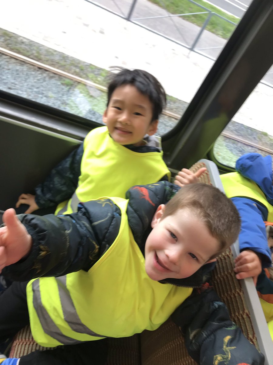 Reception are having so much fun on  the tram! We are listening to the sounds and learning about how it works! 🚃