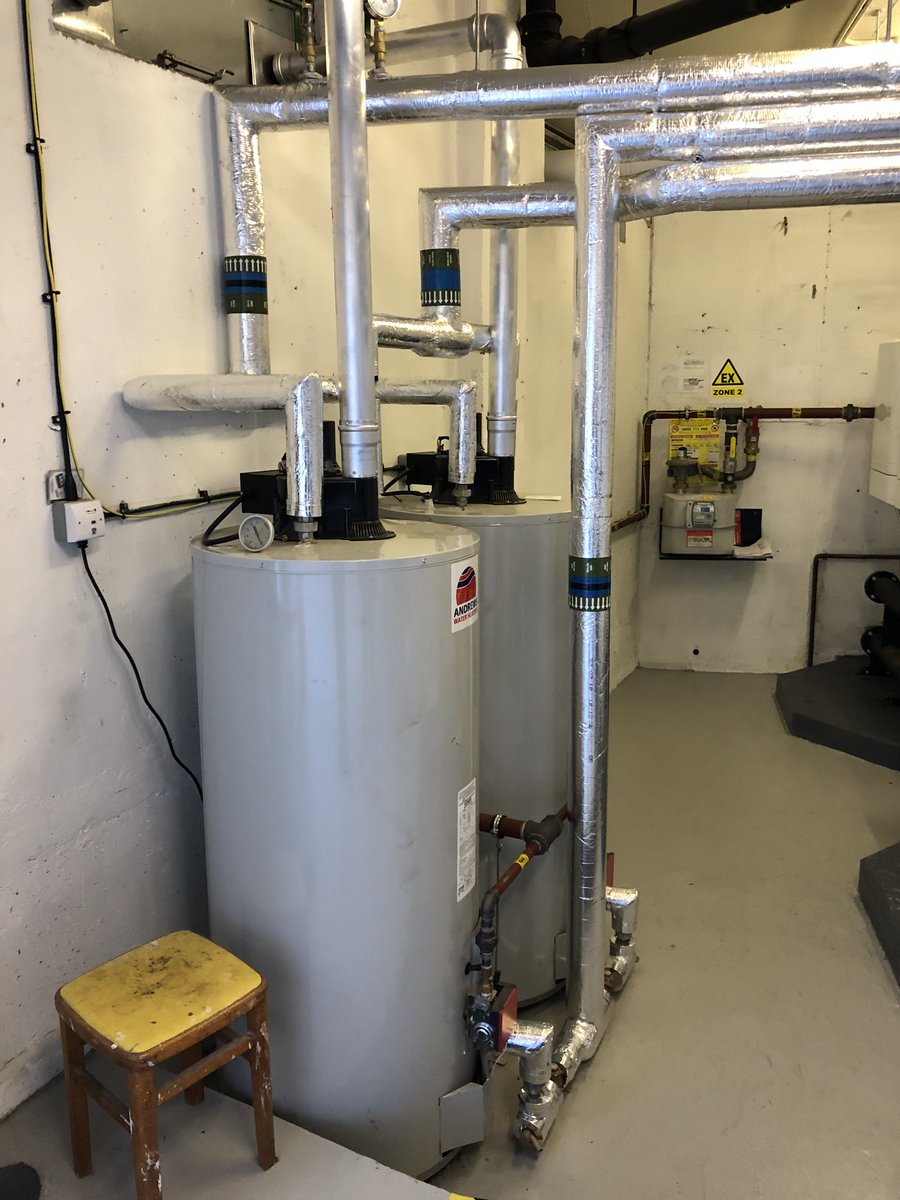 IHandC's tweet photo. Out with the old, in with the new. We stripped these old Hoval combination boilers out and completely renewed them with an @idealcommercial #evomax array and two gas fired @AndrewsWH water heaters #CommercialBoilers #BoilerRoom #WaterHeaters https://t.co/ZSjbtjBhat