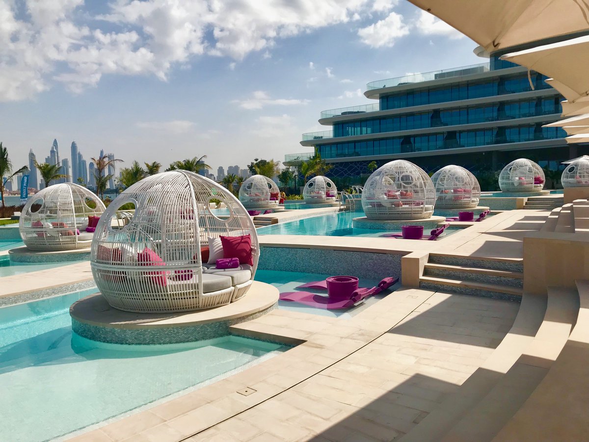 OfficialHiDubai's tweet photo. Head to Wet Deck Dubai to relax in an atmospheric lounge at W The Palm ! Soak up the sun at the pool deck with great views or grab drinks &amp; bites to enjoy under the shaded cabanas. Let #HiDubai take you there. https://t.co/54QQvXULtf #WetDeckDubai #WThePalm #WHotels @WHotels https://t.co/HiZlwKPPvL