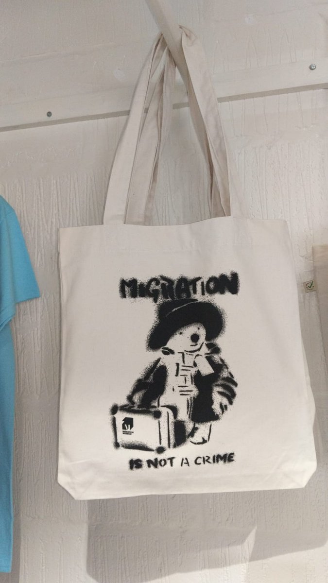 MigrationMuseum's tweet photo. This #WorldBookDay we're celebrating Paddington Bear, possibly the most famous migrant storybook character, he fled from Peru in search of a new home in 1958. Reincarnated by Banksy in 2009 he is in our #100Images of Migration gallery &amp; our shop! #AllOurStories https://t.co/vzKRehuXdy