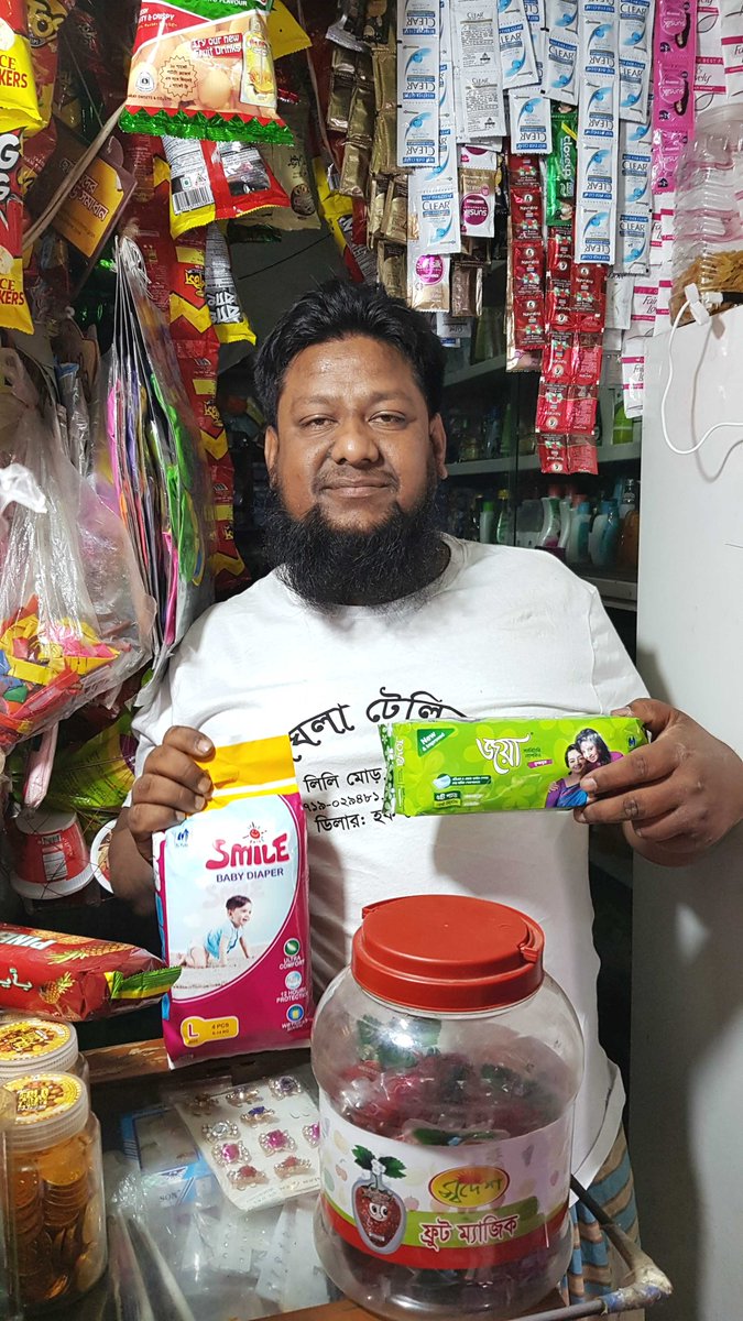 Bopinc's tweet photo. #WorldWomenWeek: Everyone has a part to play! #Bop trader in Bangladesh proudly holds up feminine hygiene products which he sells to adolescent girls. Through this the girls don’t miss school and avoid diseases. #BalanceforBetter #IWD2019 https://t.co/P8o1eBQA1U