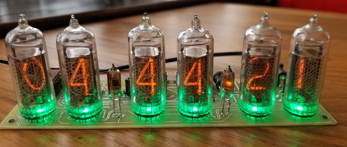 cyrten's tweet photo. Office Fun!  Cool #Nixie clock arrived today!  Big thanks to Pete our resident Funmeister!   Next step build the case... If you are looking for a fun #tech project you can build these (they come finished or in kits).  I am building one with my 13 yr old daughter.  #stem https://t.co/cttmc2LMnQ