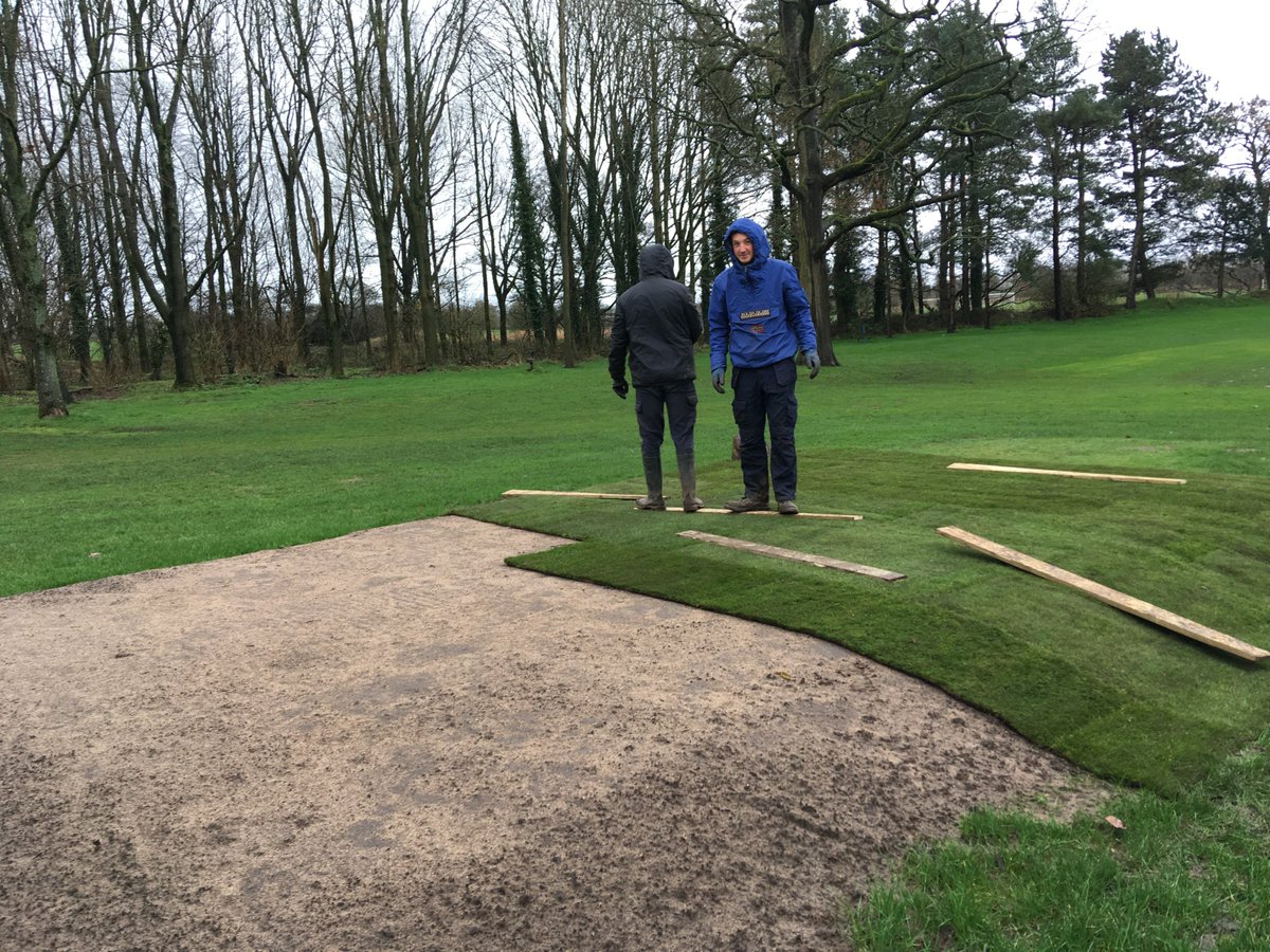 My_SportsTurf's tweet photo. Myerscough sports turf students re-turfing the 1st tee. Nice job shame about the weather.☂️😬 https://t.co/hXgksstfFO