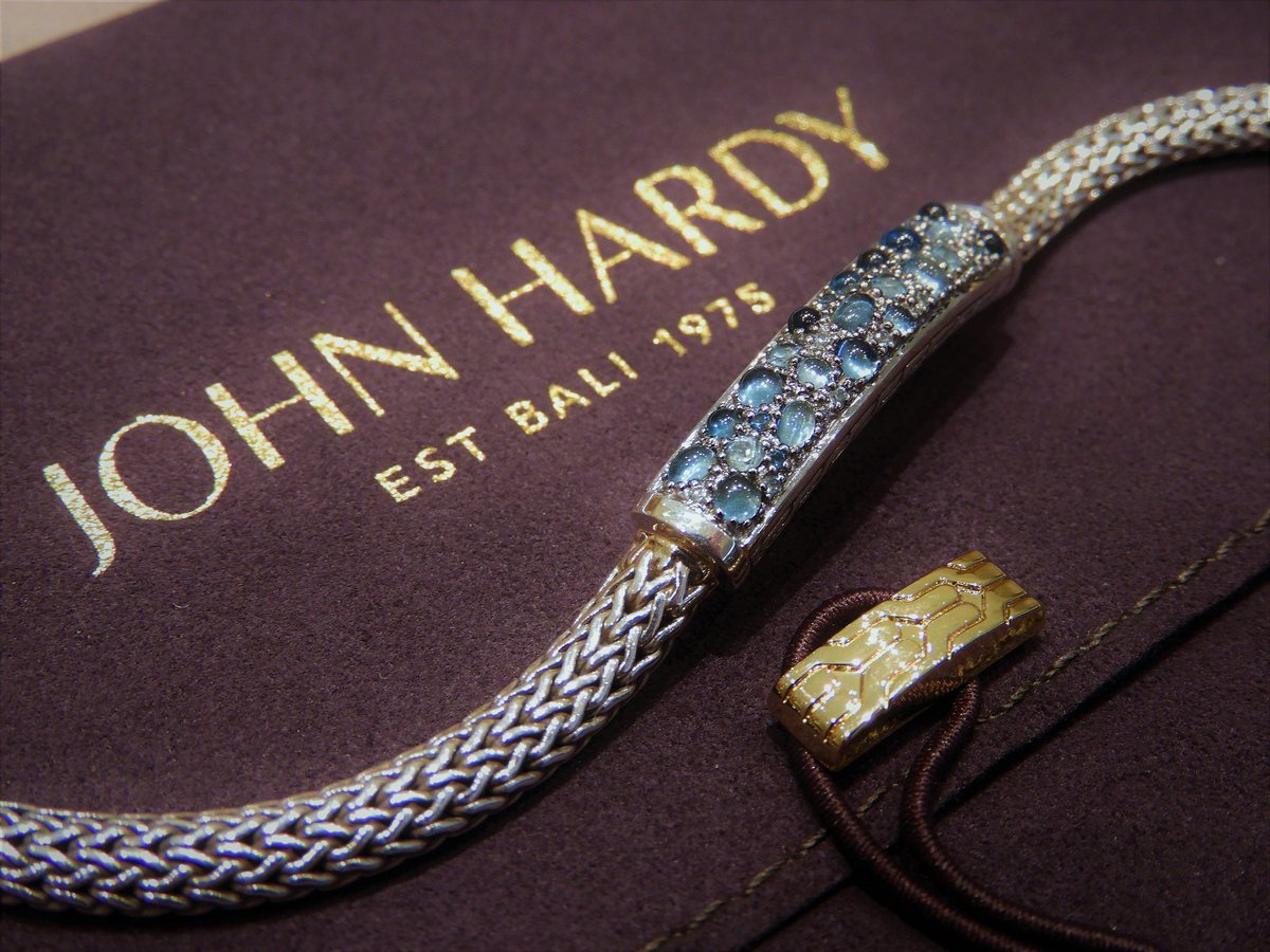 A bubbly cluster of blue topaz adorn the surface of this Classic Chain bracelet by John Hardy.  It's a tantalizingly tactile experience!