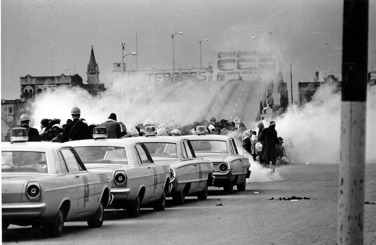 ajplus's tweet photo. 54 years ago today, state troopers attacked 600 civil rights demonstrators led by John Lewis and Hosea Williams at Selma with nightsticks and tear gas. 

At least 50 were hospitalized. Lewis suffered a fractured skull.

That day is remembered as Bloody Sunday. https://t.co/Qnm3pweCtM