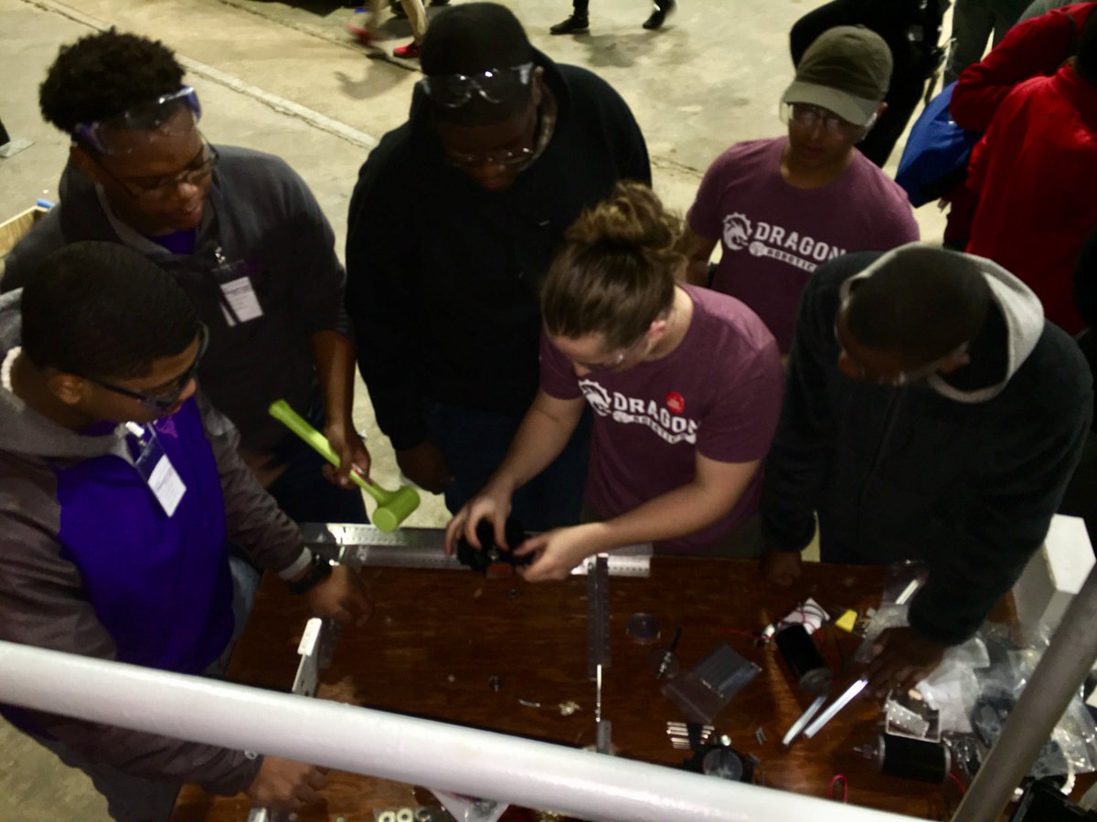 bayvill's tweet photo. Gracious professionalism, complements of Brandon, teaching Java and Sean &amp; Srikar, helping a rookie team build their robot. #dragonrobotics  #DestinationDeepSpace #RockCityRegionals https://t.co/GrWGRfHcxx