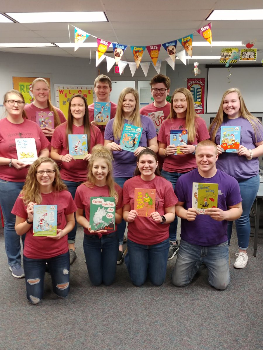 andym1952's tweet image. Members of Pleasant Ridge High School National Honor Society read Dr. Seuss books to elementary school students today. NHS members pose with the books they read. @USD449 #RamPRide #EveryStudentEveryDay