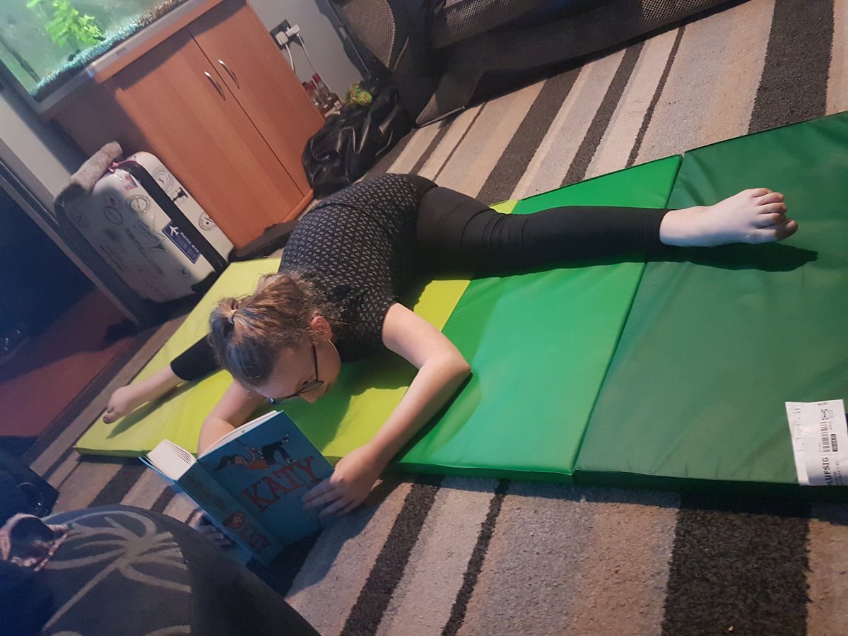 Janine98474412's tweet photo. Nieve doing some stretching whilst reading #worldbookday #catchmereading @ColeridgeSchool ππ§‘ https://t.co/LiXxfRiWZU