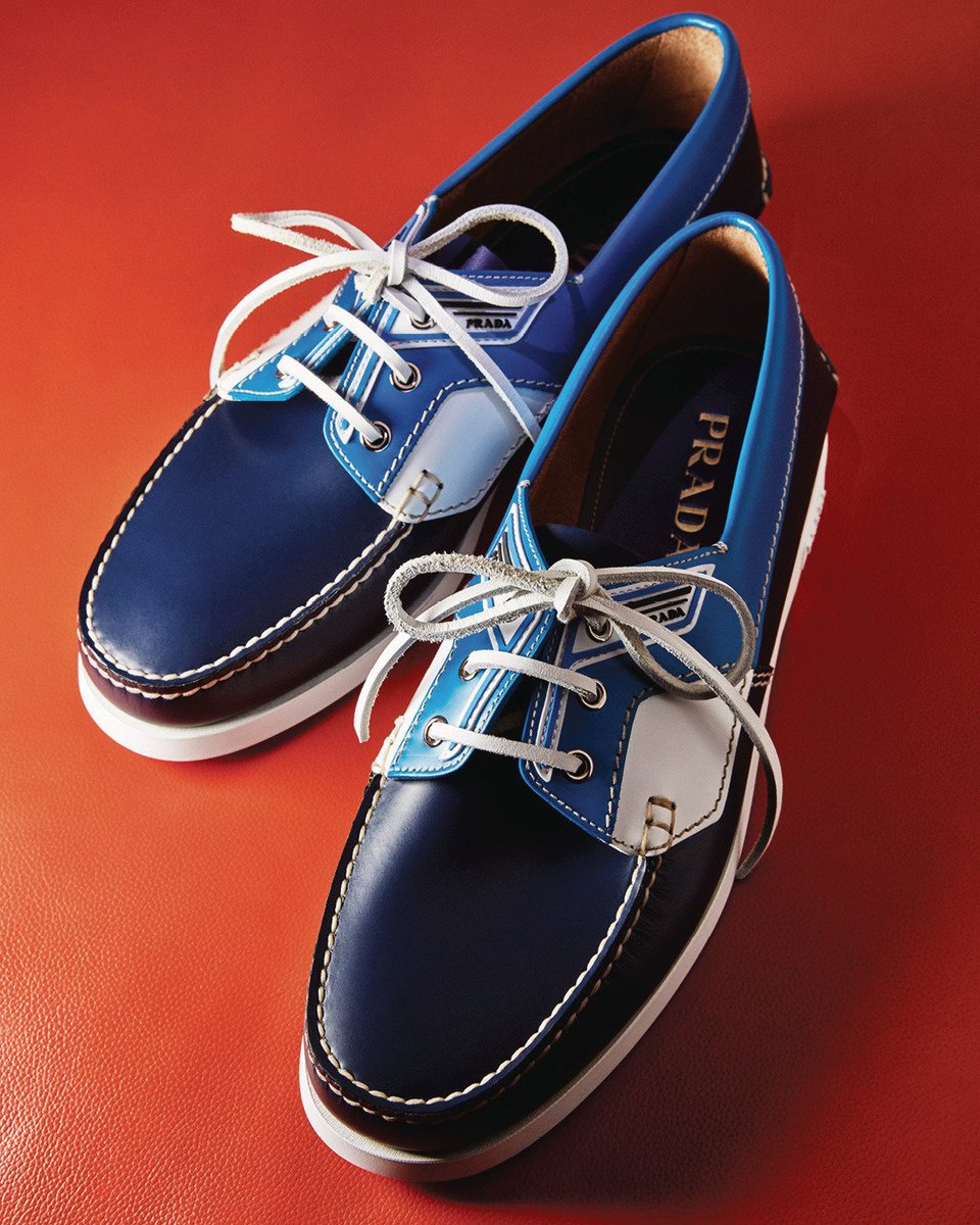 Prada brushed leather boat shoes in sky 