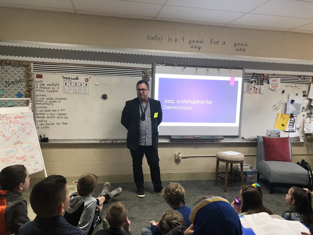 missHteaches4th's tweet photo. Jazz music... 🎼 American democracy... 🇺🇸 Are they connected?? Today we learned that YES! they are, and it’s an amazing analogy! Evangel University Jazz director Mr. Griffin visited our classroom to help us connect music to our government! @jtsdnixa https://t.co/emXwpzFWNu
