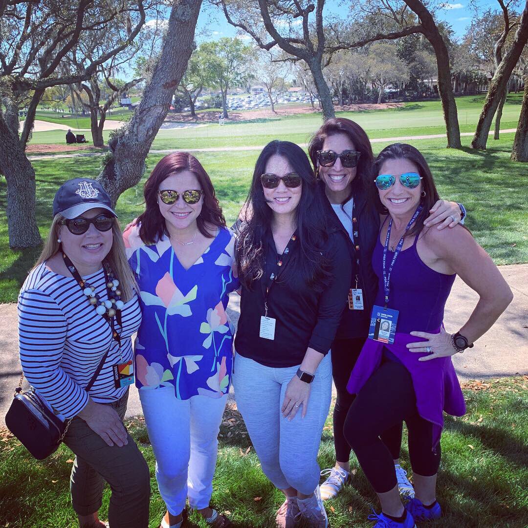 PTI_SportsMktg's tweet photo. Team PTI with the one and only Audrey Leishman! Brainstorming and planning incredible things for the @BeginAgainFdtn all while watching @marcleish do his thing! 🏌🏼‍♂️#teampti #anotherdayattheoffice #missingafew https://t.co/kbQxMwrBUO