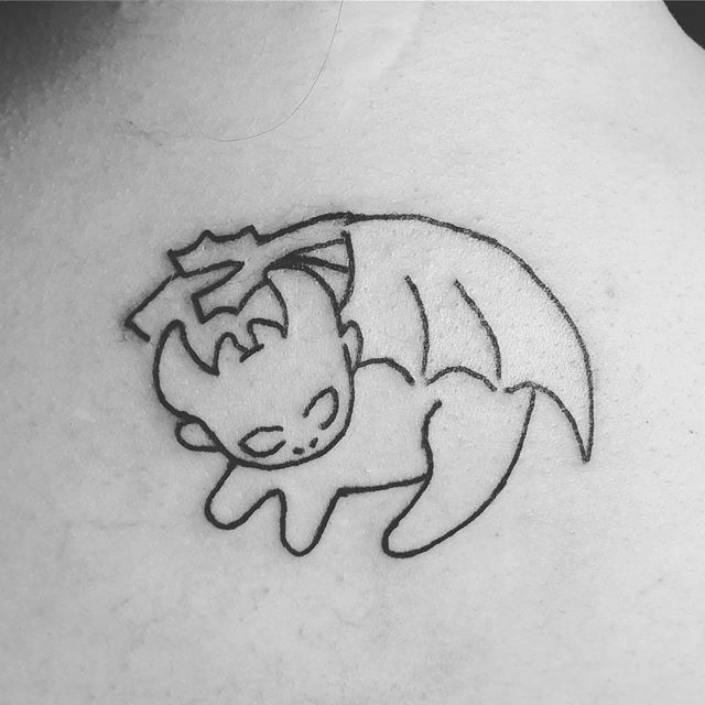 Age Tattoos on Tumblr: Toothless from How to Train Your Dragon Not my usual  but I had tons of fun #agetattoo #toothless (at Colossus Tattoo)