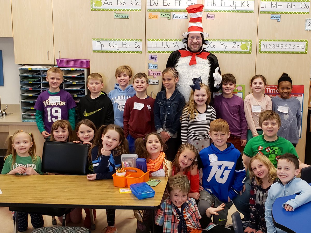 GBS_UA's tweet photo. Ms Michaud’s class posing and dabbing with the Cat in the Hat for #ReadAcrossAmerica week ❤️ 📚 https://t.co/EHMFXFBaZK