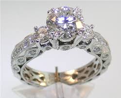 [Also shows off her rock and preens]