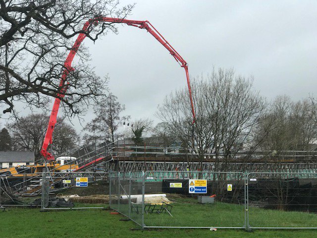 CumbriaCC's tweet photo. Latest works on rebuilding Ford Bridge at Burneside. Base layer is being put down today. The wet weather isn't helping but we're making good progress. #Cumbria #StormDamageRepairs https://t.co/d5EcdJJOJt