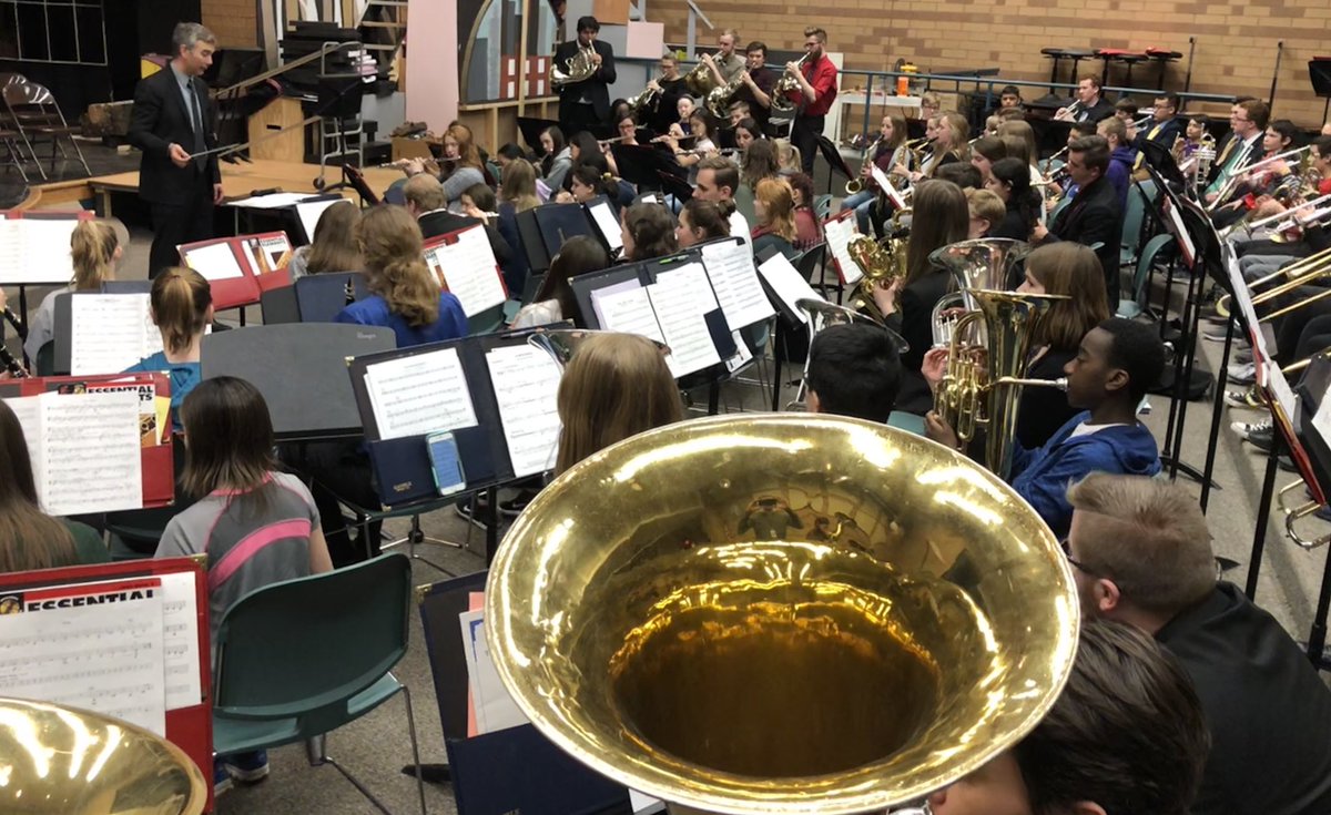 MisterBents's tweet photo. We were visited by the @uwec_bands Symphony Band yesterday! Our students listened to, played with, learned from, and were inspired by this outstanding college ensemble, led by Dr. Philip Ostrander. @NewsAtTheRidge https://t.co/rtoGQiLILP