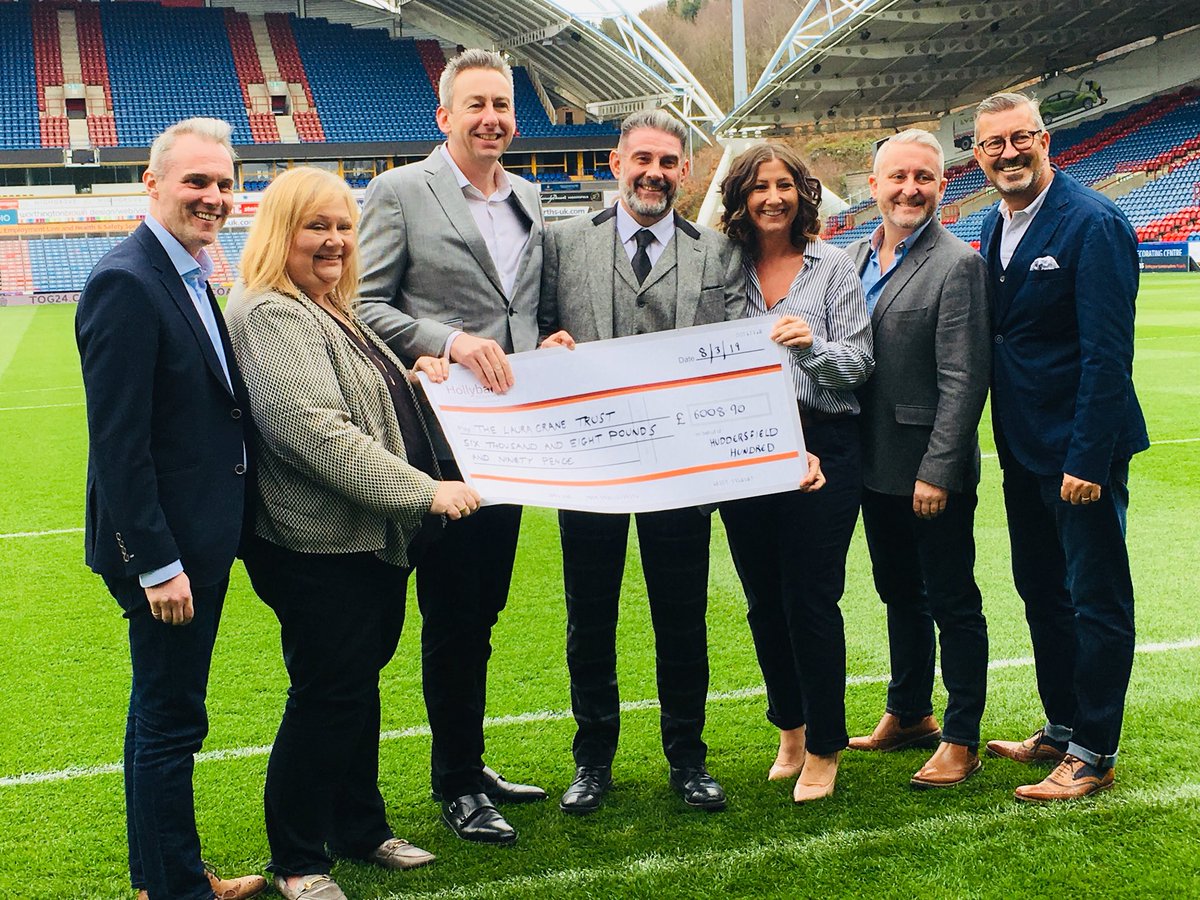 The #HuddersfieldHundred #BluesBall raised an astonishing £6,008.90 for each of their chosen charities! A HUGE thanks to organisers <a href="/bastionestates/">Guy Davis</a> <a href="/seeitnowsports/">See It Now Group</a> @JWworkholding pictured with Huddersfield Town’s <a href="/SeanMJarvis/">Sean Jarvis</a> <a href="/JohnWilliams672/">John Williams</a> &amp; LCYCT’s <a href="/PamThornes/">Pam Thornes</a> <a href="/helenmervill/">Helen Mervill</a>