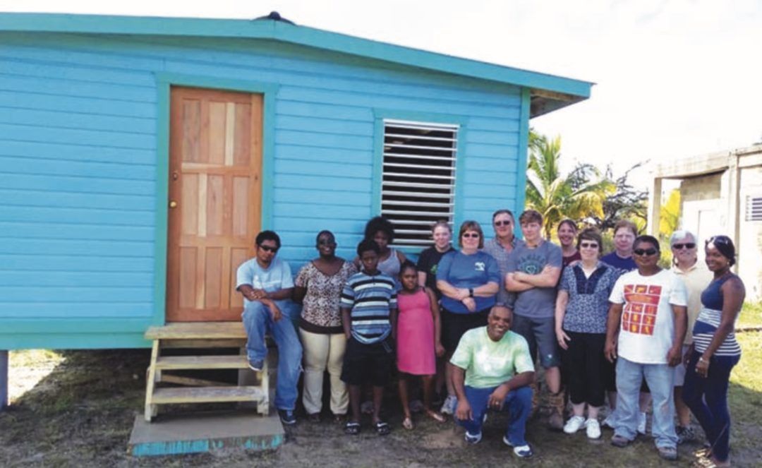 SCN_Volunteers's tweet photo. A family remembers a loved one by helping build a house in Belize. Volunteers joined the Sisters of Charity of Nazareth for a family in need. https://t.co/iPxATv9y0J https://t.co/NFzp6boydH