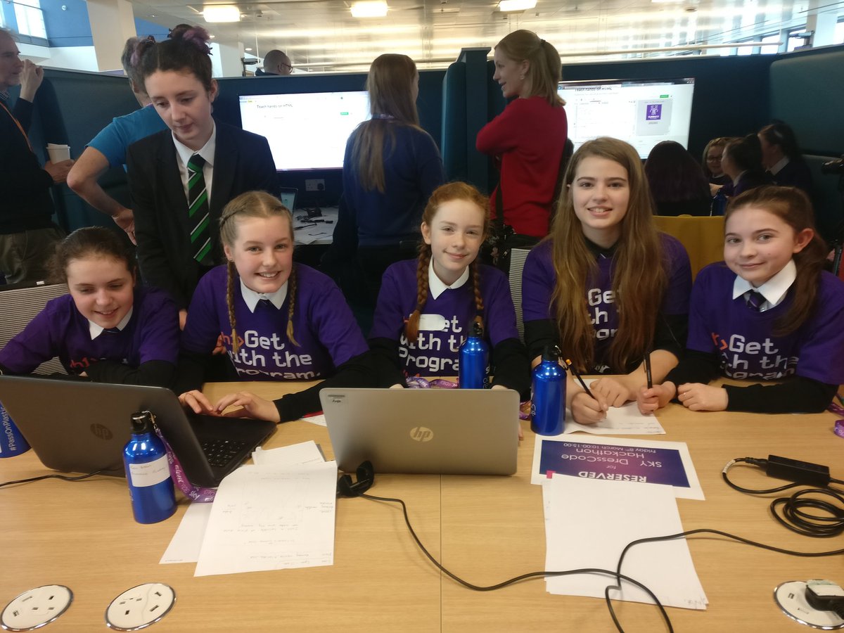 S1 girls having a great time working on their programming challenge at the #dressCode hackathon