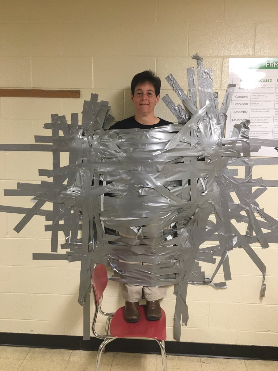 frmspride's tweet photo. Homerooms that won March attendance challenge duct taped Ms Adams to the wall https://t.co/b2sy569q4E