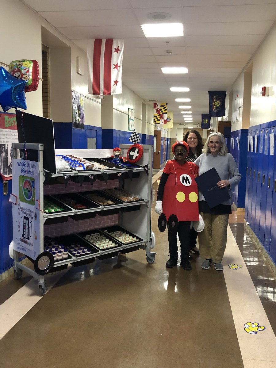 Delaware’s First Lady Tracey Quillen Carney helps celebrate School Breakfast Week with Sharon Brown (Mario)