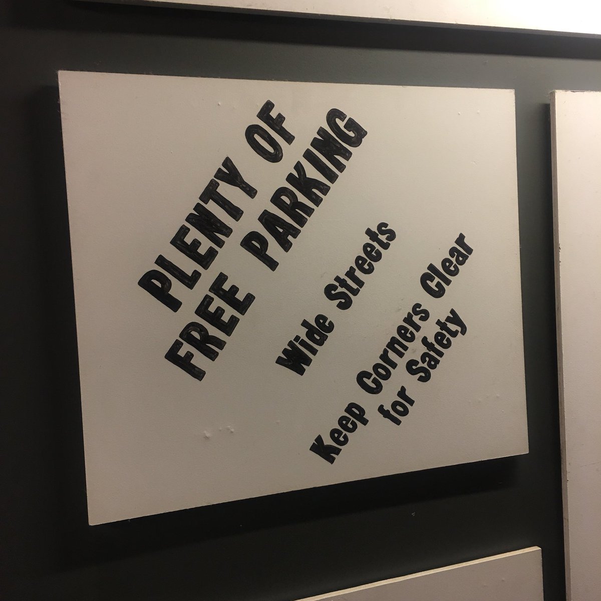 SmartGrowthCEO's tweet photo. Plenty of free parking. Wide streets. Keep corners clear for safety. #NOTwhatwewant #notwhatweneed #itsasignfridays @completestreets @T4America @SmartGrowthUSA https://t.co/7JW3v3qjsB