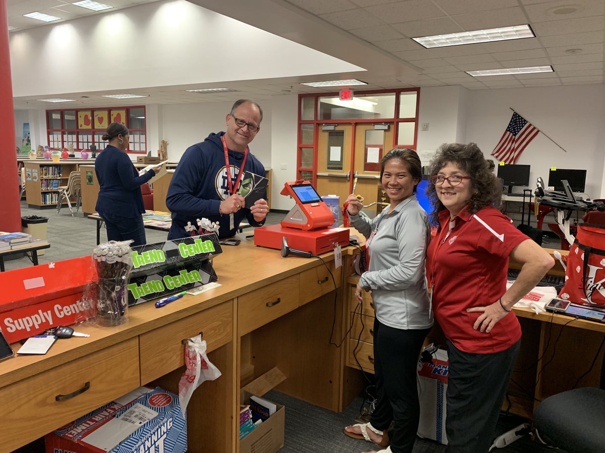 Dr Leblanc picks up a good book at our KJH book fair. Thank you everyone for supporting our library