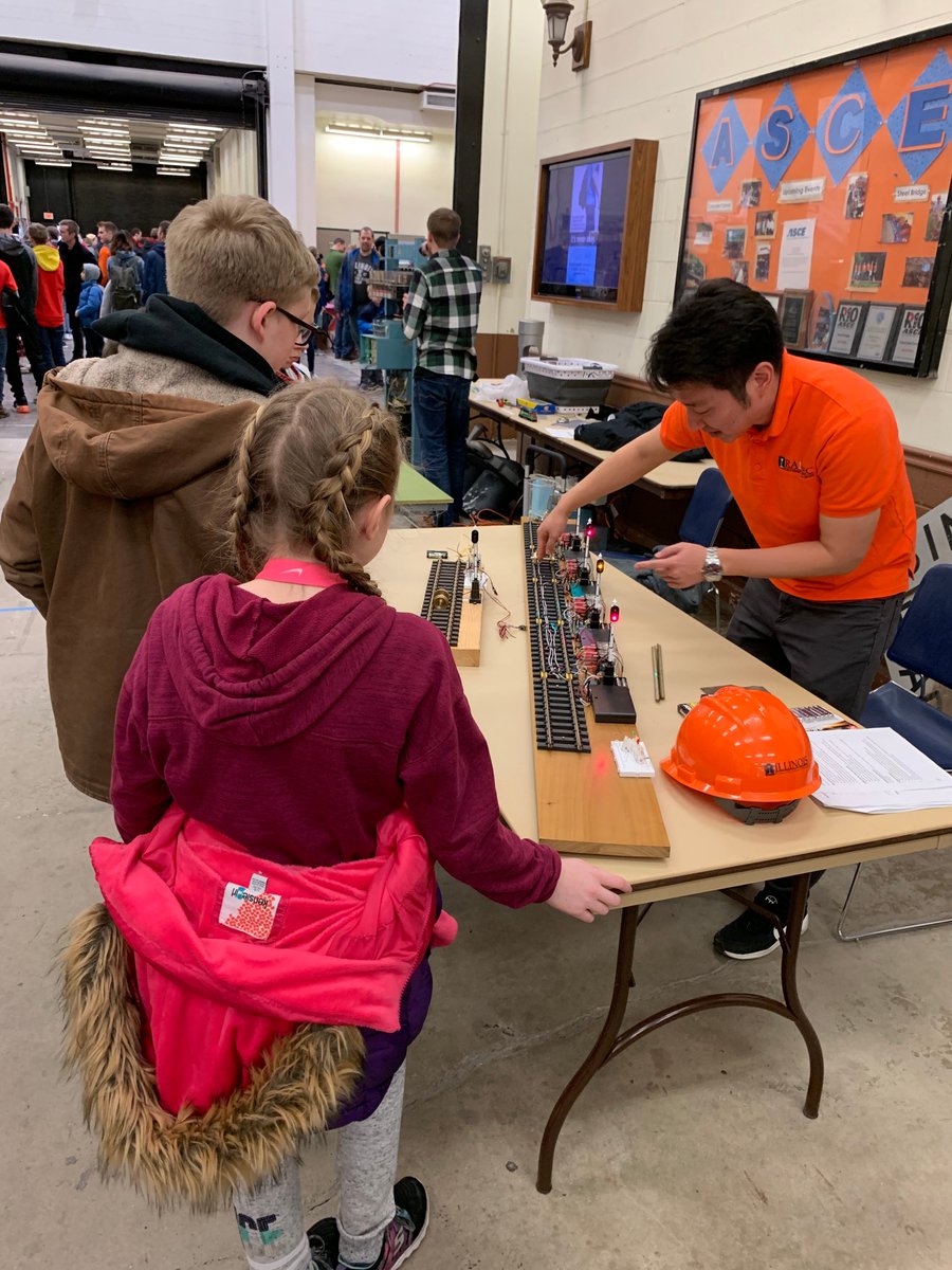 RailTECatIL's tweet photo. U of I AREMA Student Chapter, @CNRailway and #JRCentral have multiple rail exhibits at @IllinoisEOH. Stop by Newmark Lab's Crane Bay between 9am-4pm today & tomorrow to learn about #RailroadEngineering through various interactive activities! #FutureRailroaders #STEM #K12outreach https://t.co/LVNdNdVGFj