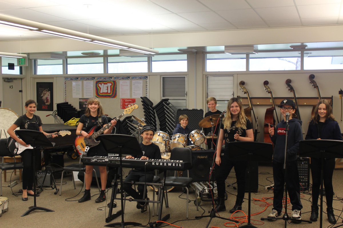 CMS Rock Band entertains during a rainy day lunch period.