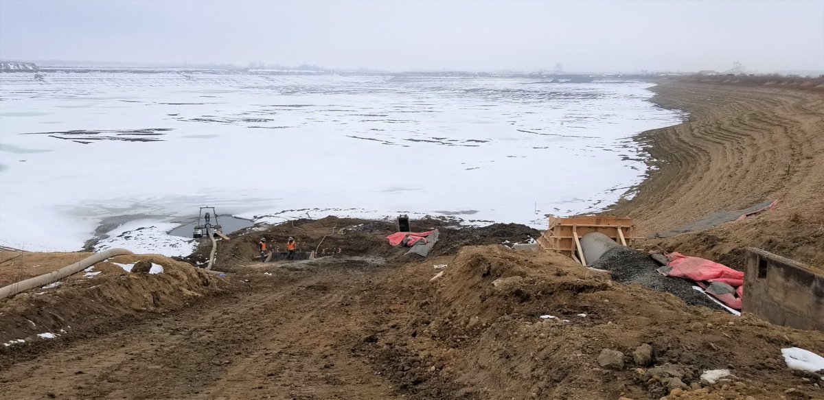 CWCB_DNR's tweet photo. Muddy and cold conditions not slowing down construction on Shore Lake Pond C Infrastructure improvements. Gravel pit = storage reservoir helping with Well Augmentation Subdistrict of @CentralCOWater manage its water supplies. #CWCBLoanProgram #COH2OhYeah https://t.co/88kXqvZfva
