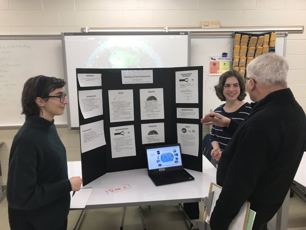 EdisonSTEMprg's tweet photo. 11th grade Global STEM students presenting their ideas on how to remove space trash. #EdisonGlobalSTEM @FCPSSTEAM https://t.co/Y7jvNoORzE