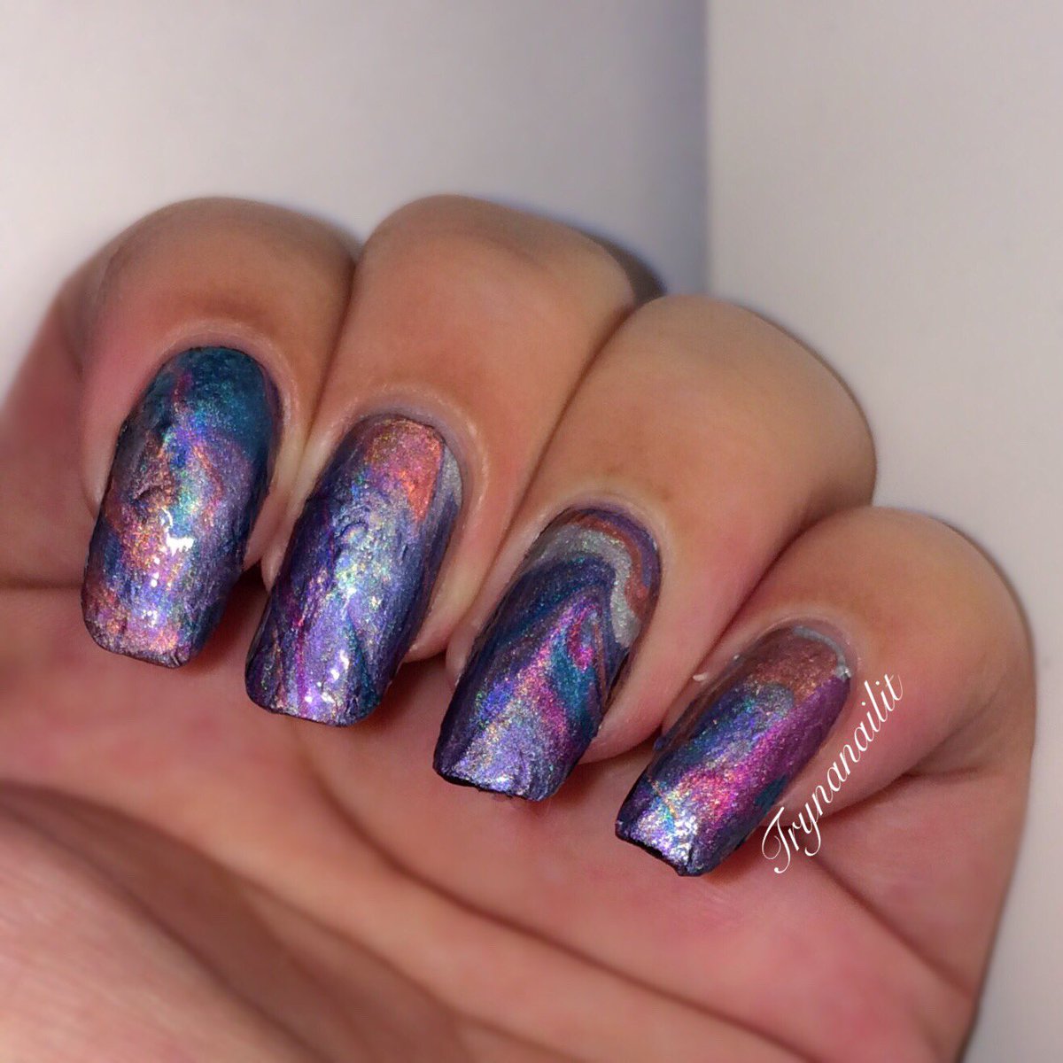 trynanailit's tweet photo. Drip marble!

I used the @ChinaGlaze OMG Flashback collection for this. All that sweet holo 😍💿 https://t.co/y5gOuiPv2n