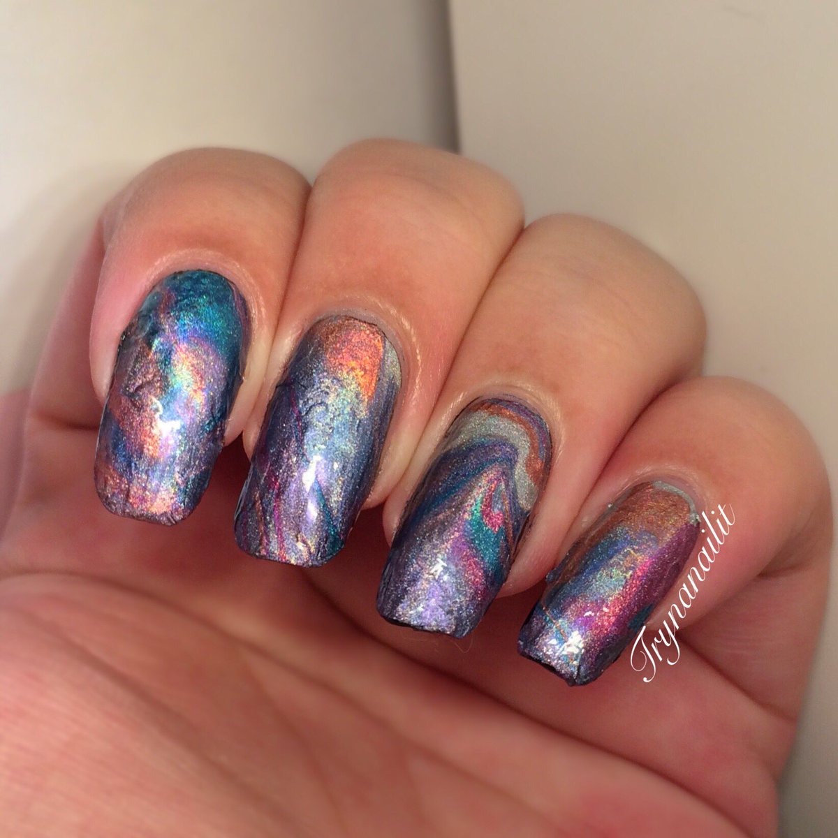 trynanailit's tweet photo. Drip marble!

I used the @ChinaGlaze OMG Flashback collection for this. All that sweet holo 😍💿 https://t.co/y5gOuiPv2n