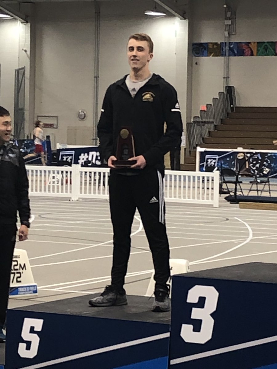 nwutfxc's tweet photo. Trent Koehler (JR) with his #NCAA ALL-AMERICAN trophy and medal in the long jump! In his career Trent has picked up 3️⃣ All-American honors while making the National Meet🖐🏾times. That’s a pretty good percentage!! #nwutf #pwolfnation https://t.co/HIL2XFrXAm