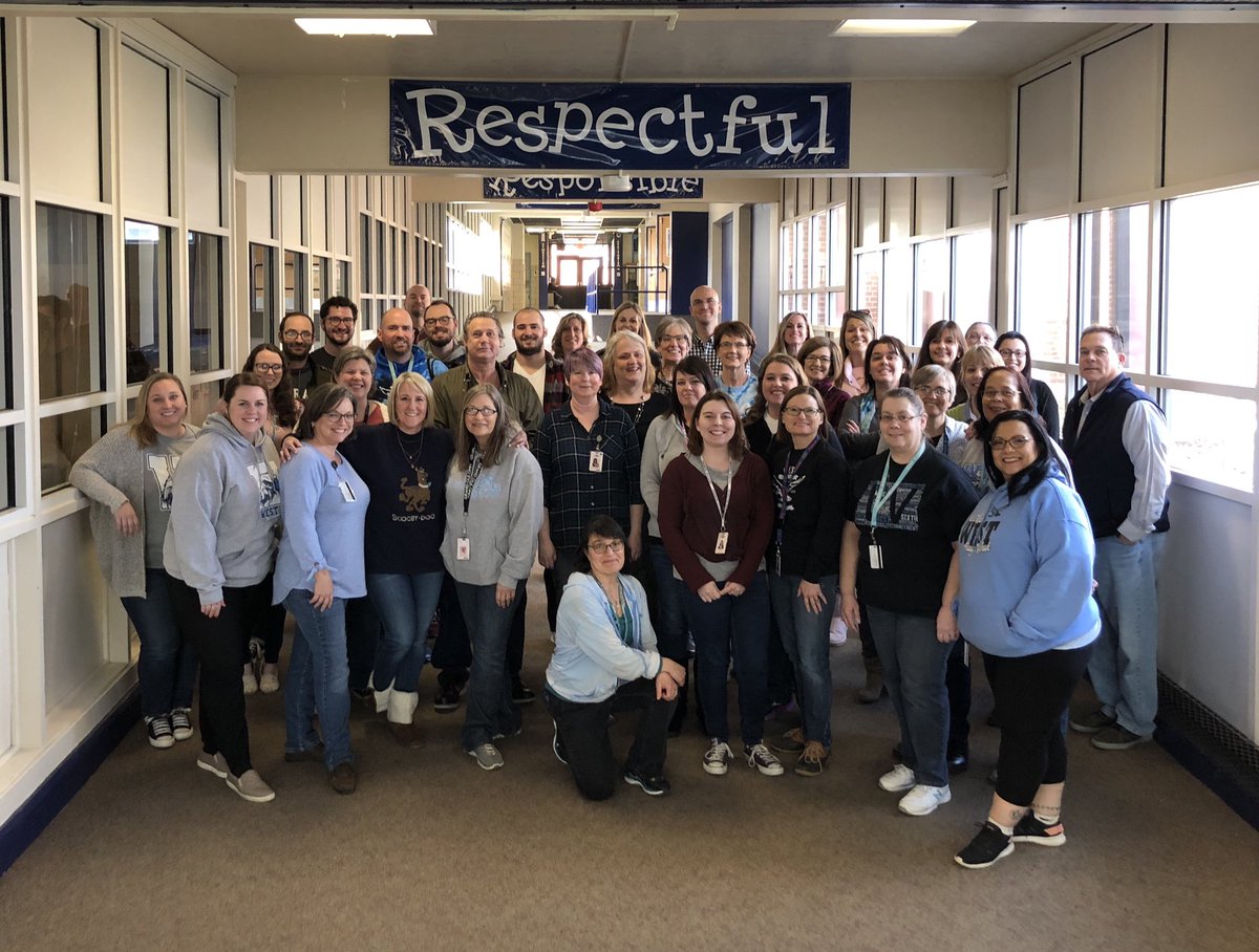 DJBrucks's tweet photo. @KyleHayden11 @WestWarhawks @clark_huesemann @hendersonengs @McCownGordon @usd497 We took a staff photo on the ramp before we left for Spring Break! https://t.co/lqdIn1tydB