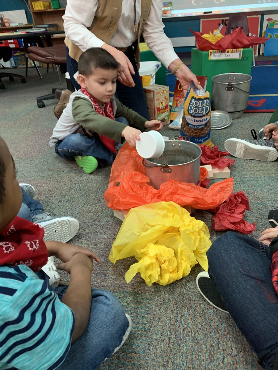 The cowboys set up camp this afternoon. Nothing like trail mix around the fire! #Texan2Step #bestexans