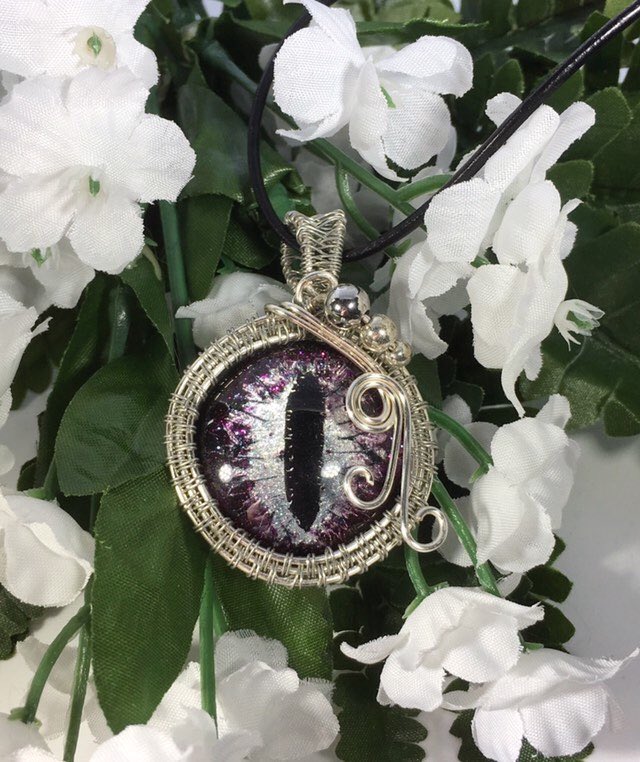 DragonWired's tweet photo. Excited to share the latest addition to my #etsy shop: #handpainted #wirewrapped #dragoneyependant #TheWiredDragon https://t.co/cc76eOFDo1 https://t.co/V9earPXTYR