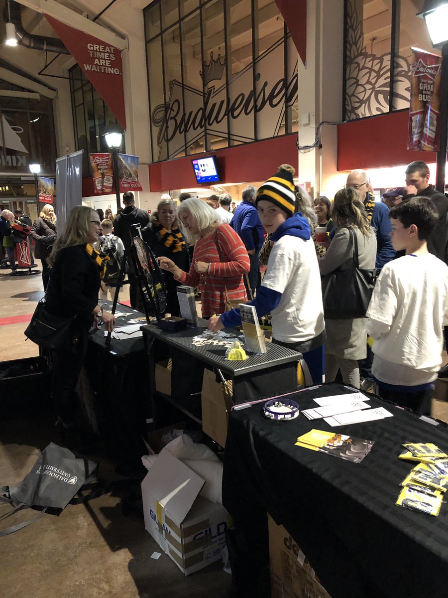 DalTigers's tweet photo. Less than five minutes to tip off and we are kitting up the @DalTigers fans at the @Dal_Alumni and @dalplex booth on the @ScotiabankCtr concourse! #goDalgo #TigerPride #BlackandGold https://t.co/FSaJRM4MZV