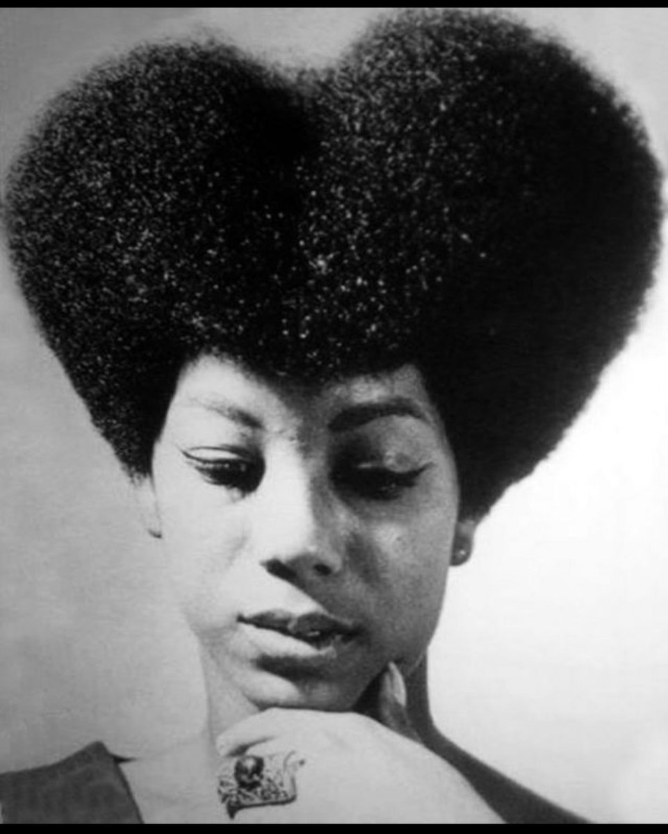 theafrodigiac's tweet image. black women with heart-shaped afros.