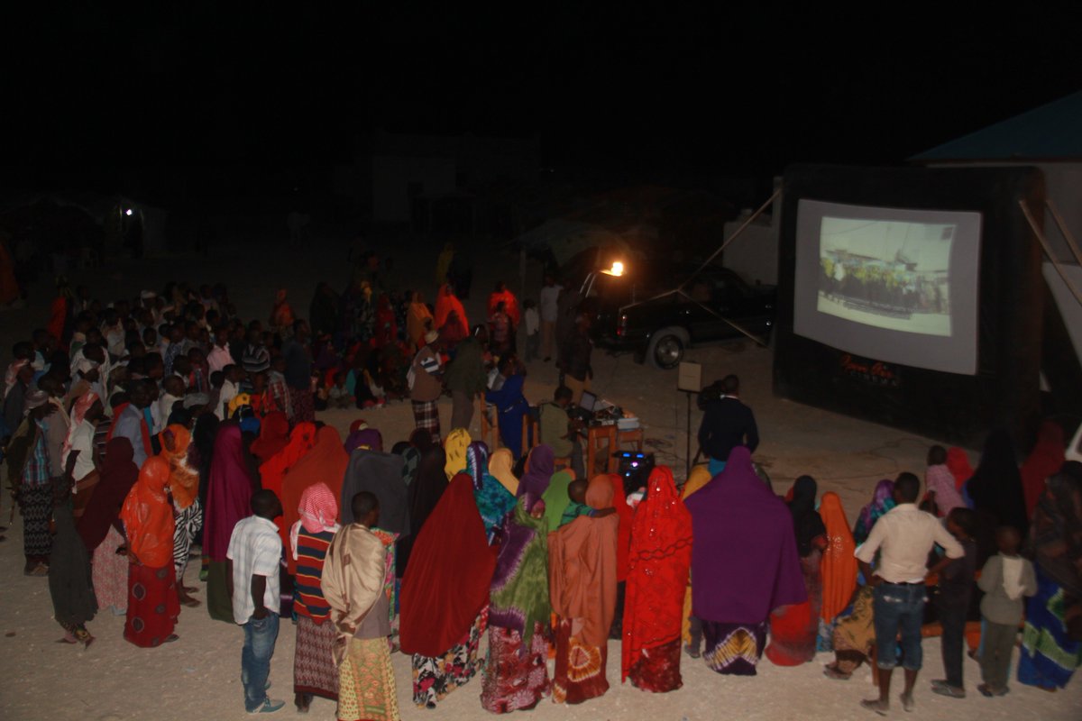 SomaliaPdrc's tweet photo. PDRC doing #peacebuilding outreach 4 Magacley & Qoriley communities. Use of Mobile Cinema with @SomaliaPdrc peace themed films & poems. #PeaceThroughInnovation #20YearsInPeace https://t.co/sAC2jswZhO
