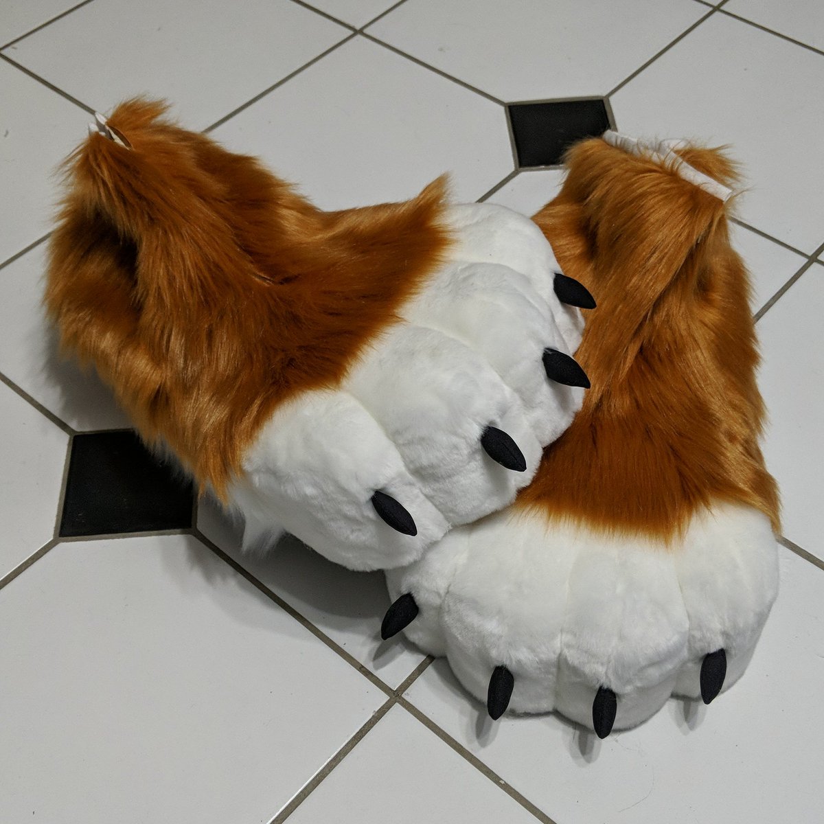 CabbitsCo's tweet photo. Some feet paws I completed featuring a lace up shoe, rubber soling, zipper cuff, and stuffed claws. #FursuitFriday #paws https://t.co/pcBIUMkRNH