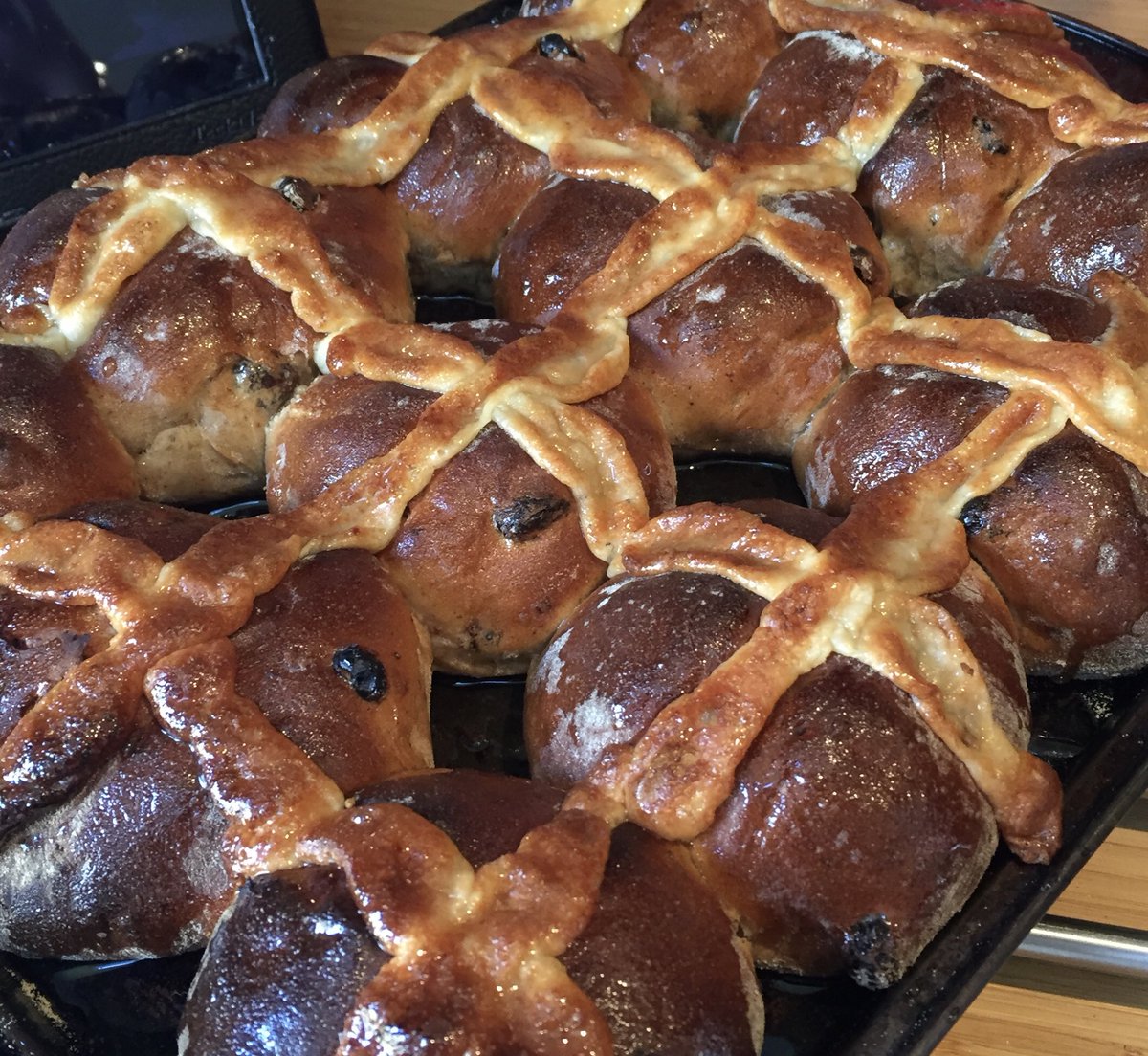 A little bake for the weekend...marzipan topped hot cross buns. howtofeast.com/home-cooking/s…