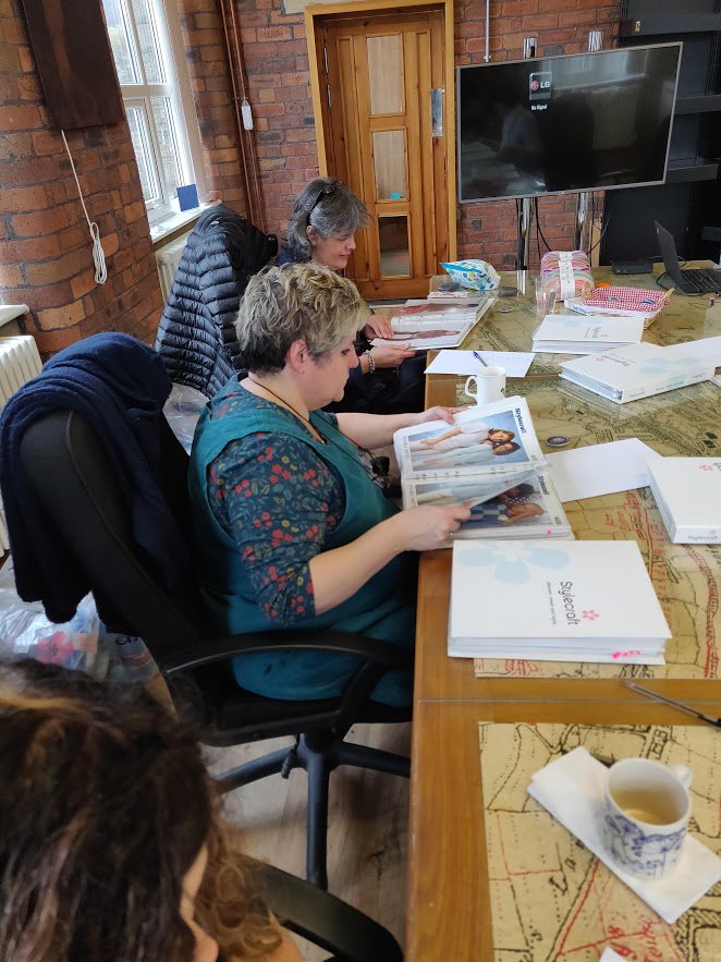 StylecraftYarn's tweet photo. Our lovely #Blogstars are at a gathering at the Mill this weekend. One of the tasks we set them was to have a look through our archive for patterns to help celebrate our 30th anniversary. As you can see there was plenty to look at and this tinsel set certainly caught the eye. https://t.co/xQ0iyRcqiV
