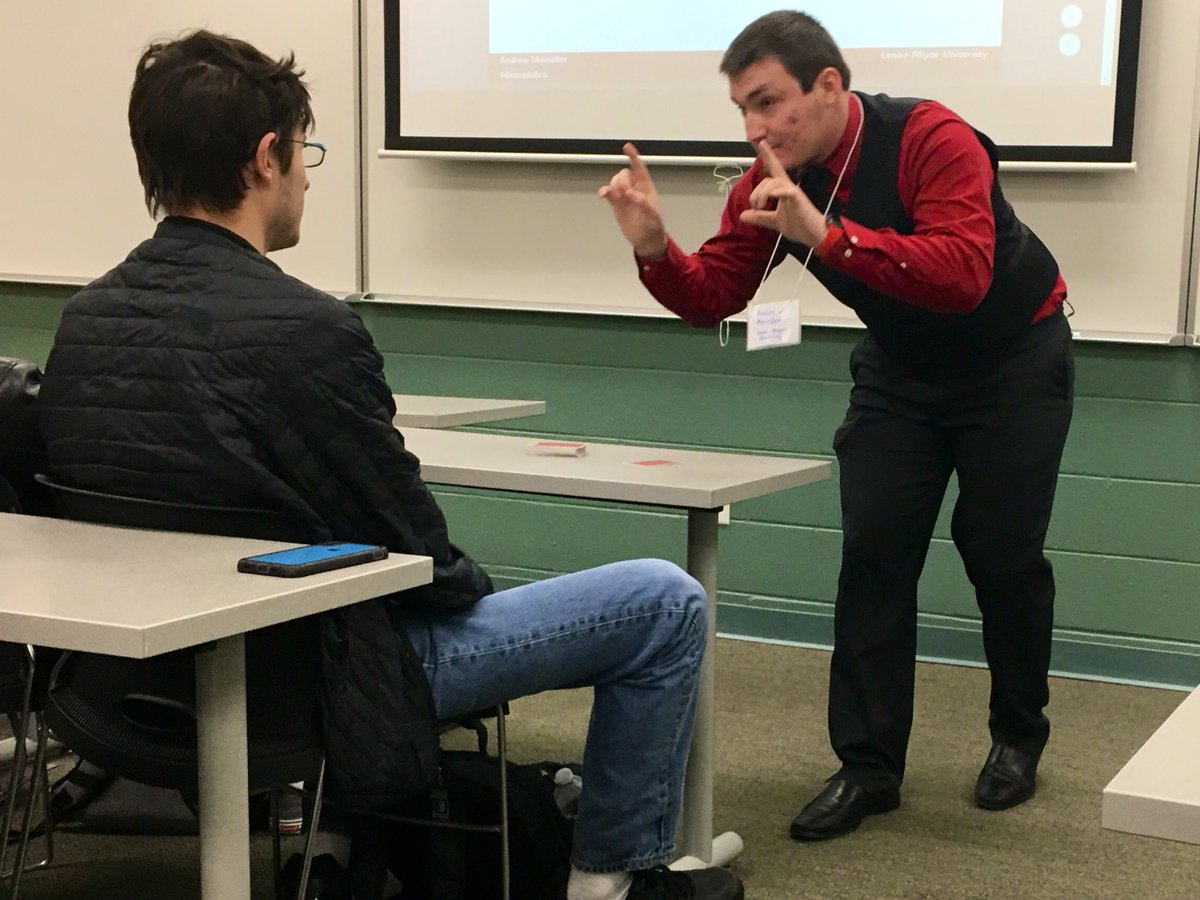 timchartier's tweet photo. The walls are line with a standing audience. Andrew Mosteller of Lenoir-Rhyne performs a math card trick published in 1898 in his #MAASE19 talk “Abracadabra: Math, Magic and More!” The more? Proofs of the trick that got a loud audible “ahhhhh”. https://t.co/nJY0dVXtWm